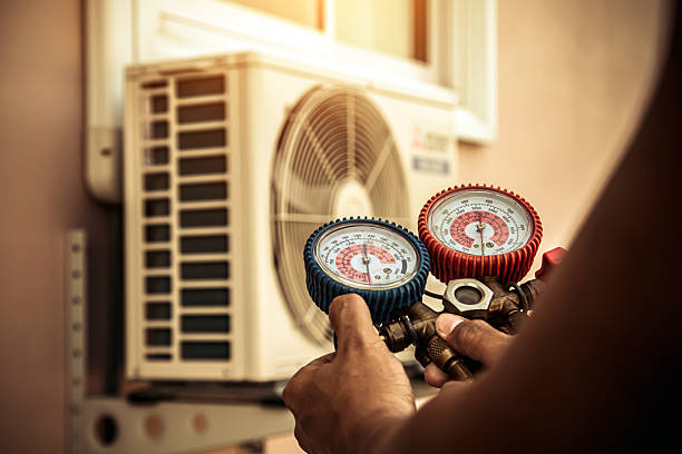 Professional Hvac technician working in Amherst, OH